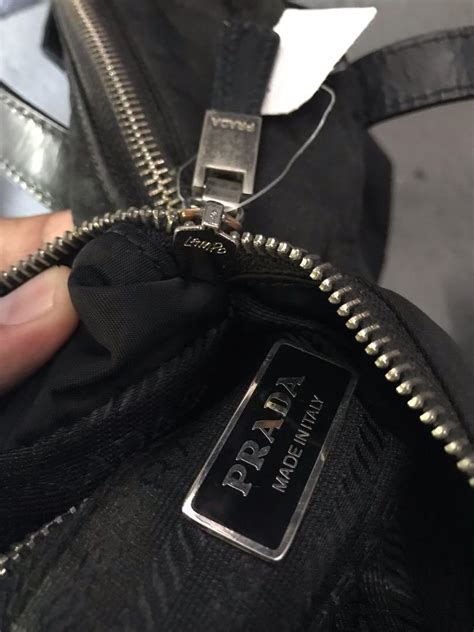 lampo zipper prada|how to authenticate prada bags.